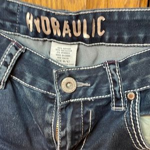 Hydraulic distressed skinny jeans